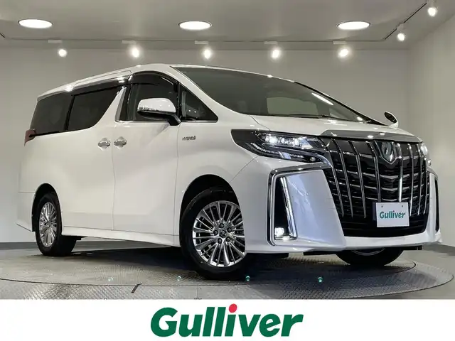 トヨタ アルファードハイブリット SR 愛知県 2019(令1)年 4.4万km ホワイトパールクリスタルシャイン アルパインＢＩＧＸ１１型ナビ/フルセグTV／CD／DVD／BT／HDMI/アルパイン１２．８型フリップダウンモニター/サンルーフ/デジタルインナーミラー/衝突軽減ブレーキ/両側電動スライドドア/レーダークルーズコントロール/ビルトインＥＴＣ/ＢＳＭ（ブラインドスポットモニター）/シートヒーター・エアシート/３眼LEDヘッドライト/前後型ドライブレコーダー/バックカメラ