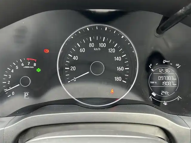 ホンダ ヴェゼル S 福岡県 2014(平26)年 9.8万km ホワイトオーキッドパール 純正メモリナビ【VXM-145VSi】/　(AM/FM/CD/DVD/Bluetooth/ワンセグTV)/バックカメラ/横滑り防止/クルーズコントロール/純正17インチアルミホイール/ルーフレール/電格ウィンカーミラー/ドアバイザー/黒色ハーフレザーシート/パドルシフト/ブレーキホールド/シートヒーター/アイドリングストップ/ETC/フロントガラス熱線スイッチ/保証書/ナビ取扱説明書
