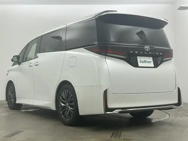 トヨタ ヴェルファイア Z プレミア 岡山県 2024(令6)年 0.9万km プラチナホワイトパールマイカ １３．２型有機EL後席ディスプレイ/左右独立ムーンルーフ/デジタルインナーミラー/ユニバーサルステップ/ブラウンプレミアムナッパレザーシート/純正１４インチディスプレイオーディオ/（ナビ/フルセグTV/Carplay/HDMI/USB】/トヨタチームメイト/　・アドバンストパーク/　・アドバンストドライブ/トヨタセーフティーセンス　/　・プリクラッシュセーフティ/　・レーントレーシングアシスト/　・レーダークルーズコントロール/　・アダプティブハイビームシステム/　・ロードサインアシスト/パノラマビューモニター/両側パワースライドドア/ビルトインＥＴＣ２．０/三眼LEDヘッドライト/置くだけ充電/1列目２列目シートヒーター/1列目２列目エアシート/ステアリングヒーター/純正フロアマット/純正19インチAW/パドルシフト/新車保証書/スペアキー×1