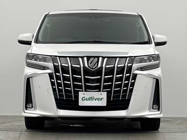 トヨタ アルファード S Cパッケージ 大阪府 2020(令2)年 7万km ホワイトパールクリスタルシャイン サンルーフ/JBLサウンドシステム/純正10.5インチメーカーナビ/【AM/FM/CD/DVD/Bluetooth/フルセグTV】/純正13.3インチフリップダウンモニター/前後ドライブレコーダー【GL-03AP】/アラウンドビューモニター/デジタルインナーミラー/ビルトインETC2.0/トヨタセーフティセンス/・プリクラッシュセーフティ/・レーントレーシングアシスト/・レーダークルーズコントロール/・オートマチックハイビーム/・ロードサインアシスト/・リアクロストラフィックアラート/・ブラインドスポットモニター/・インテリジェントクリアランスソナー/・インテリジェントパーキングアシスト/・先行車発進お知らせ機能/両側電動パワースライドドア/パワーバックドア/電格ウィンカーミラー/オートブレーキホールド/ドアバイザー/ステアリングヒーター/D/N席2列目シート/ヒーター・エアシート/D/N席列目シート/パワーシート/黒レザーシート/純正フロアマット/純正18インチAW/オートライト/スペアタイヤ
