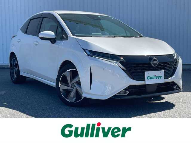 日産 オーラ G レザーエディション 滋賀県 2022(令4)年 1.9万km ブリリアントホワイトパール 純正９型ナビ/・Bluetooth/フルセグ/アラウンドビューモニター/革巻きステアリング/ステアリングリモコン/ETC/デジタルインナーミラー/オートブレーキホールド/シートリフター/オートリトラミラー/LEDオートライト/オートハイビーム/フォグライト/側方支援/後側方支援/エマージェンシーブレーキ/駐車支援/シャシー制御/ブラインドスポットモニター/スマートキー