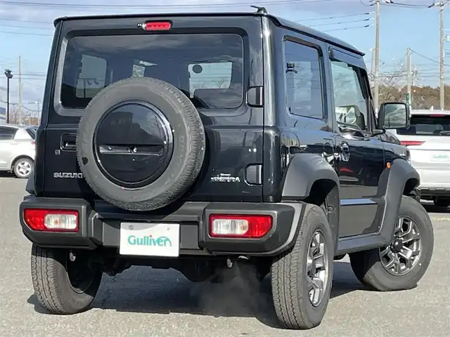 スズキ ジムニー シエラ JC 道央・札幌 2024(令6)年 0.5万km ブルーイッシュブラックパール3 ４WD/ワンオーナー/純正ディーラーOPナビ/CD/DVD/BT/フルセグ/デュアルセンサーブレーキサポート/横滑り防止装置/クルーズコントロール/ヒルディセントコントロール/レーンキープアシスト/バックカメラ/トランスファレバー/アイドリングストップ/前席シートヒーター/レザー調シートカバー/革巻きステアリング/ステアリングリモコン/AC100V/プッシュスタート/スマートキー/LEDヘッドライト/オートライト/オートハイビーム/フォグランプ/電動格納ミラー/ヒーテッドドアミラー/ウィンカーミラー/純正フロアマット/ドアバイザー/スペアキー