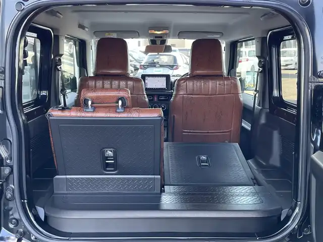 スズキ ジムニー シエラ JC 道央・札幌 2024(令6)年 0.5万km ブルーイッシュブラックパール3 ４WD/ワンオーナー/純正ディーラーOPナビ/CD/DVD/BT/フルセグ/デュアルセンサーブレーキサポート/横滑り防止装置/クルーズコントロール/ヒルディセントコントロール/レーンキープアシスト/バックカメラ/トランスファレバー/アイドリングストップ/前席シートヒーター/レザー調シートカバー/革巻きステアリング/ステアリングリモコン/AC100V/プッシュスタート/スマートキー/LEDヘッドライト/オートライト/オートハイビーム/フォグランプ/電動格納ミラー/ヒーテッドドアミラー/ウィンカーミラー/純正フロアマット/ドアバイザー/スペアキー