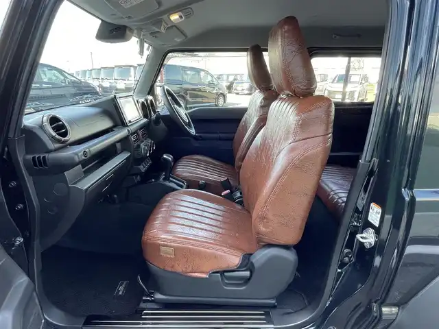 スズキ ジムニー シエラ JC 道央・札幌 2024(令6)年 0.5万km ブルーイッシュブラックパール3 ４WD/ワンオーナー/純正ディーラーOPナビ/CD/DVD/BT/フルセグ/デュアルセンサーブレーキサポート/横滑り防止装置/クルーズコントロール/ヒルディセントコントロール/レーンキープアシスト/バックカメラ/トランスファレバー/アイドリングストップ/前席シートヒーター/レザー調シートカバー/革巻きステアリング/ステアリングリモコン/AC100V/プッシュスタート/スマートキー/LEDヘッドライト/オートライト/オートハイビーム/フォグランプ/電動格納ミラー/ヒーテッドドアミラー/ウィンカーミラー/純正フロアマット/ドアバイザー/スペアキー