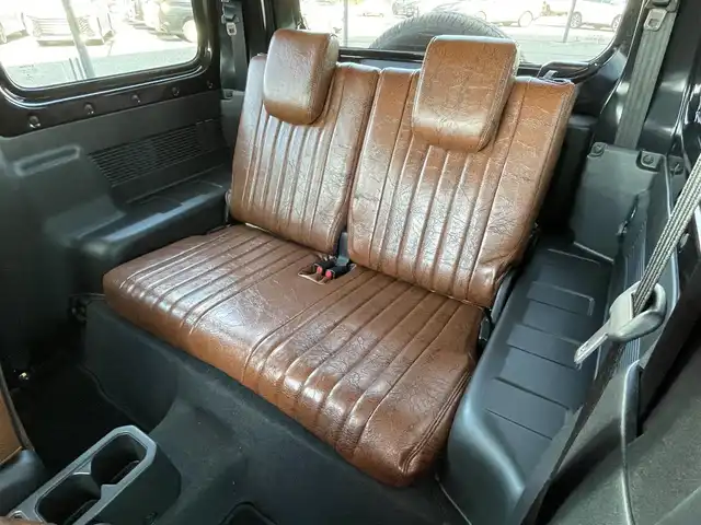 スズキ ジムニー シエラ JC 道央・札幌 2024(令6)年 0.5万km ブルーイッシュブラックパール3 ４WD/ワンオーナー/純正ディーラーOPナビ/CD/DVD/BT/フルセグ/デュアルセンサーブレーキサポート/横滑り防止装置/クルーズコントロール/ヒルディセントコントロール/レーンキープアシスト/バックカメラ/トランスファレバー/アイドリングストップ/前席シートヒーター/レザー調シートカバー/革巻きステアリング/ステアリングリモコン/AC100V/プッシュスタート/スマートキー/LEDヘッドライト/オートライト/オートハイビーム/フォグランプ/電動格納ミラー/ヒーテッドドアミラー/ウィンカーミラー/純正フロアマット/ドアバイザー/スペアキー