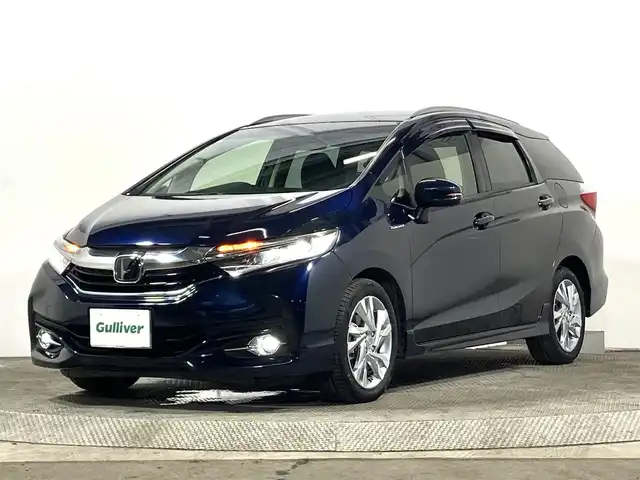 ホンダ シャトル ハイブリッド Z ホンダセンシング 大阪府 2019(平31)年 3.9万km ミッドナイトブルービームM 純正ナビ(フルセグ/DVD再生/Bluetooth) 衝突軽減 バックカメラ ETC ドラレコ レーダークルコン ハーフレザー レーンアシスト オートライト スマートキー Pスタート ルーフレール