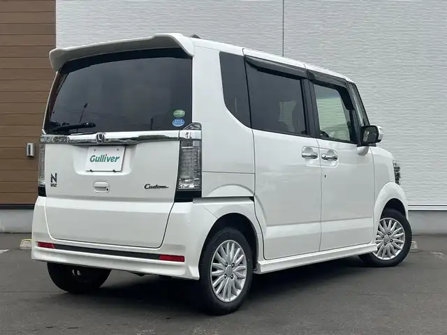ホンダ Ｎ ＢＯＸ カスタム G Lパッケージ 秋田県 2016(平28)年 6.3万km プレミアムホワイトパールⅡ 純正ナビ/LEDヘッドライト/４WD/フルセグ/バックカメラ/スマートキー/社外アルミ/片側パワスラ/アイドリングストップ/プッシュスタート/前席シートヒーター/ステアリングスイッチ/純正エンジンスターター/純正フロアマット/純正ドアバイザー/オートライト/オートエアコン/パワーステアリング/パワーウィンドウ/横滑り防止/電動格納ウィンカーミラー
