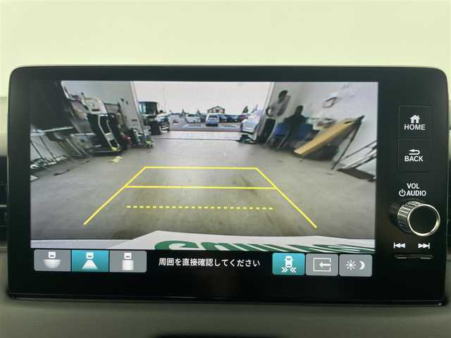 ホンダ ヴェゼル ハイブリッド e:HEV Z 富山県 2025(令7)年 0.1万km未満 プラチナホワイトパール 登録済未使用車/純正ディスプレイオーディオ（AM/FM/BT/USB/フルセグ）/バックカメラ/ETC/ブラインドスポットモニター/ハーフレザーシート/シートヒーター/ハンドルヒーター/衝突被害軽減システム/レーダークルーズコントロール/レーンキープアシスト/コーナーセンサー/横滑り防止装置/アイドリングストップ/オートLEDライト/フォグライト/純正アルミホイール/置くだけ充電/革巻きステアリング/ステアリングスイッチ/スマートキー/スペアキー