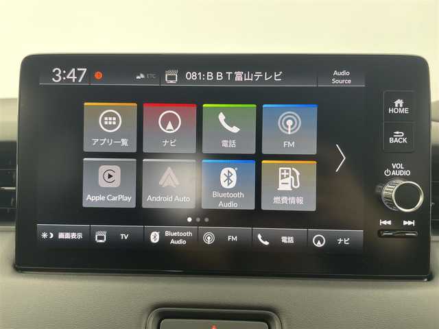ホンダ ヴェゼル ハイブリッド e:HEV Z 富山県 2025(令7)年 0.1万km未満 プラチナホワイトパール 登録済未使用車/純正ディスプレイオーディオ（AM/FM/BT/USB/フルセグ）/バックカメラ/ETC/ブラインドスポットモニター/ハーフレザーシート/シートヒーター/ハンドルヒーター/衝突被害軽減システム/レーダークルーズコントロール/レーンキープアシスト/コーナーセンサー/横滑り防止装置/アイドリングストップ/オートLEDライト/フォグライト/純正アルミホイール/置くだけ充電/革巻きステアリング/ステアリングスイッチ/スマートキー/スペアキー
