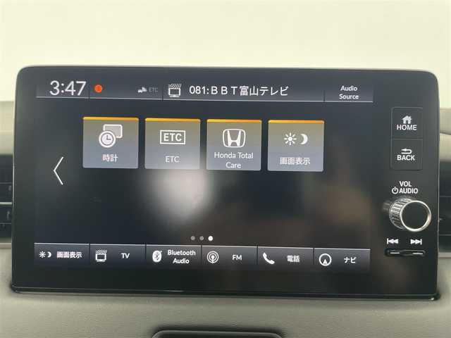 ホンダ ヴェゼル ハイブリッド e:HEV Z 富山県 2025(令7)年 0.1万km未満 プラチナホワイトパール 登録済未使用車/純正ディスプレイオーディオ（AM/FM/BT/USB/フルセグ）/バックカメラ/ETC/ブラインドスポットモニター/ハーフレザーシート/シートヒーター/ハンドルヒーター/衝突被害軽減システム/レーダークルーズコントロール/レーンキープアシスト/コーナーセンサー/横滑り防止装置/アイドリングストップ/オートLEDライト/フォグライト/純正アルミホイール/置くだけ充電/革巻きステアリング/ステアリングスイッチ/スマートキー/スペアキー