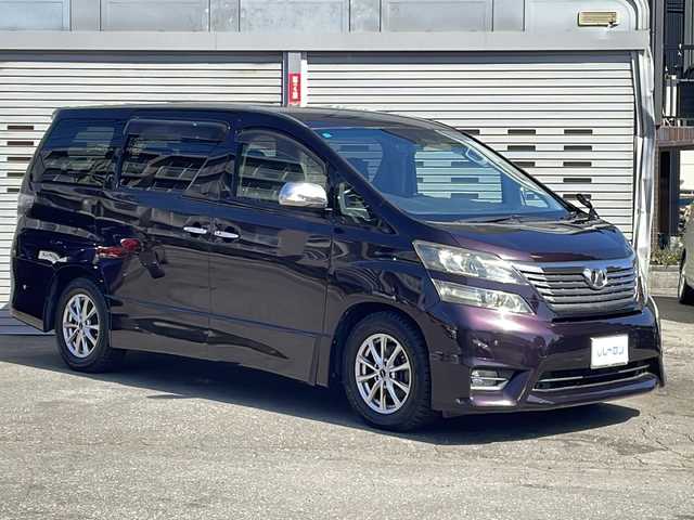 トヨタ ヴェルファイア 3．5Z プラチナセレクションⅡ 道央・札幌 2011(平23)年 12.9万km ボルドーマイカメタリック (株)IDOMが運営する【じしゃロン札幌店】の自社ローン専用車両になりますこちらは現金またはオートローンご利用価格です。自社ローンご希望の方は別途その旨お申し付けください。/・純正ナビ /・フルセグ&CD&DVD&FM&AM/・純正フリップダウンモニター/・両側電動スライドドア/・バックカメラ/・クルーズコントロール/・ビルドインETC/・パワーバックドア /・プッシュスタート/・純正フロアマット