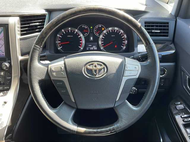 トヨタ ヴェルファイア 3．5Z プラチナセレクションⅡ 道央・札幌 2011(平23)年 12.9万km ボルドーマイカメタリック (株)IDOMが運営する【じしゃロン札幌店】の自社ローン専用車両になりますこちらは現金またはオートローンご利用価格です。自社ローンご希望の方は別途その旨お申し付けください。/・純正ナビ /・フルセグ&CD&DVD&FM&AM/・純正フリップダウンモニター/・両側電動スライドドア/・バックカメラ/・クルーズコントロール/・ビルドインETC/・パワーバックドア /・プッシュスタート/・純正フロアマット