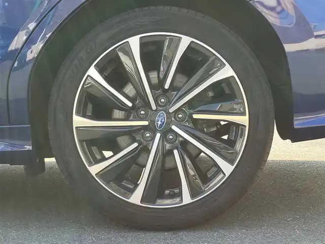 スバル レヴォーグ 1．8STIスポーツ EX 静岡県 2021(令3)年 4.1万km ラピスブルーP エンジンスタートボタン/パワーステアリング/パワーウィンドウ/AWD/MTモード付きAT/ターボ/スマートキー/オートエアコン/クルーズコントロール/USB入力端子/ETC/純正ナビ（BT/フルセグ）/バックカメラ/電動リアゲート/純正フロアマット/D席N席パワーシート/レザーシート/全席シートヒーター/純正18インチアルミホイール/ABS/横滑り防止装置/コーナーセンサー/レーンキープアシスト/オートライト/LEDヘッドライト/W+サイドエアバック/衝突軽減システム/デジタルインナーミラー/アイサイト