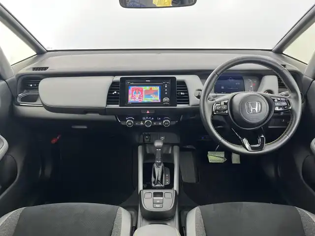 ホンダ フィット e:HEV RS 愛知県 2023(令5)年 1.8万km グレー 純正DA（ワンセグ、CS、Bluetooth）/ETC/Bカメラ/ACC/電子パーキング/オートホールド/衝突軽減ブレーキ/レーンキープアシスト/コーナーセンサー/スマートキー/ハーフレザーシート/USB/スマートキー/純正フロアマット/純正16インチAW/オートライト/三点エアバック/横滑り防止装置