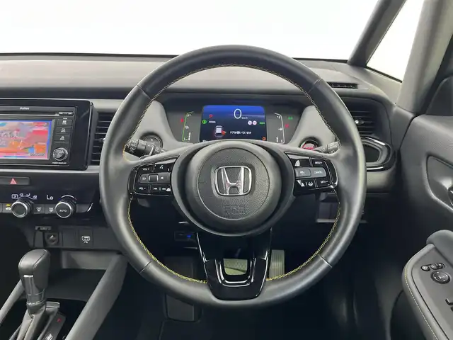 ホンダ フィット e:HEV RS 愛知県 2023(令5)年 1.8万km グレー 純正DA（ワンセグ、CS、Bluetooth）/ETC/Bカメラ/ACC/電子パーキング/オートホールド/衝突軽減ブレーキ/レーンキープアシスト/コーナーセンサー/スマートキー/ハーフレザーシート/USB/スマートキー/純正フロアマット/純正16インチAW/オートライト/三点エアバック/横滑り防止装置
