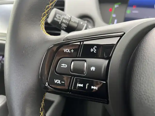 ホンダ フィット e:HEV RS 愛知県 2023(令5)年 1.8万km グレー 純正DA（ワンセグ、CS、Bluetooth）/ETC/Bカメラ/ACC/電子パーキング/オートホールド/衝突軽減ブレーキ/レーンキープアシスト/コーナーセンサー/スマートキー/ハーフレザーシート/USB/スマートキー/純正フロアマット/純正16インチAW/オートライト/三点エアバック/横滑り防止装置