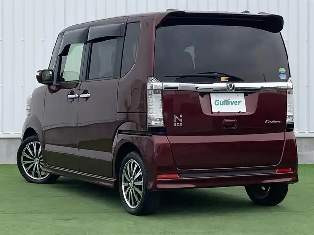 ホンダ Ｎ ＢＯＸ カスタム G ターボSSパッケージ 香川県 2014(平26)年 6.7万km プレミアムディープロッソパール 社外メモリーナビ/→AM/FM/CD/DVD/Bluetooth/フルセグTV/バックカメラ/両側パワースライドドア/シートヒーター/クルーズコントロール/GPSレーダー/前後ドライブレコーダー/革巻きステアリング/アイドリングストップ/HIDヘッドライト/ETC/プッシュスタート/スマートキー/CTBA/オートライト