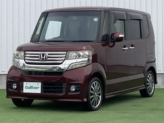 ホンダ Ｎ ＢＯＸ カスタム G ターボSSパッケージ 香川県 2014(平26)年 6.7万km プレミアムディープロッソパール 社外メモリーナビ/→AM/FM/CD/DVD/Bluetooth/フルセグTV/バックカメラ/両側パワースライドドア/シートヒーター/クルーズコントロール/GPSレーダー/前後ドライブレコーダー/革巻きステアリング/アイドリングストップ/HIDヘッドライト/ETC/プッシュスタート/スマートキー/CTBA/オートライト