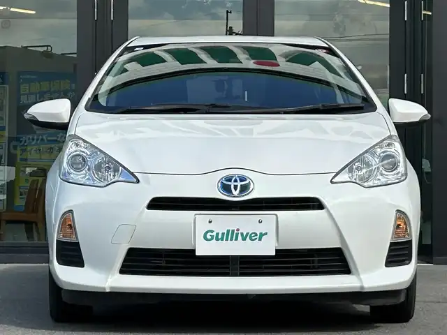 トヨタ アクア S 愛媛県 2014(平26)年 6.4万km ライムホワイトパールクリスタルシャイン 純正7型ナビ(BT/フルセグTV)/ドライブレコーダー/電格ミラー/ETC/ドアバイザー/純正フロアマット/オートライト/ヘッドライトレベライザー/ISOFIX/シガーソケット/純正ホイールキャップ/現状サマー(鉄)(175/65/R15)/PRACYIVA/禁煙車