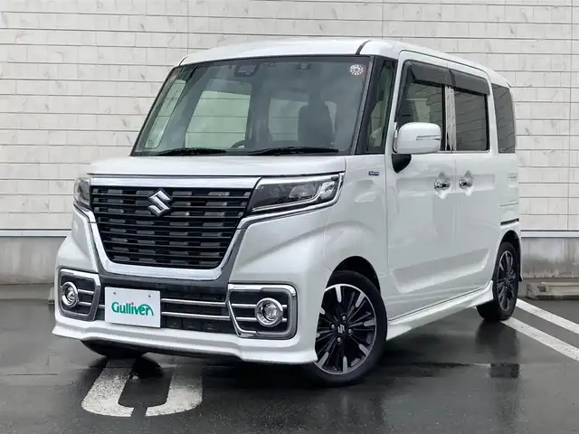 スズキ スペーシア カスタム HYBRID XS ターボ 静岡県 2018(平30)年 8.9万km ピュアホワイトP デュアルセンサーブレーキサポート/純正メモリーナビ(CN-RZ765W)/　AM FM CD DVD Bluetooth USB SD/ビルトインETC/前後方ドライブレコーダー/LEDオートヘッドランプ/レーダークルーズコントロール/シートヒーター(運転席)/両側パワースライドドア/リアクリアランスソナー/レザー調シートカバー/純正15インチアルミホイール/リアロールサンシェード/パドルシフト/フルセグTV/バックモニター