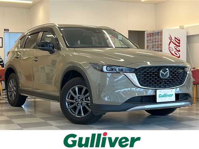 マツダ ＣＸ－５ XD フィールドジャーニー 岐阜県 2022(令4)年 1.4万km ジルコンサンドメタリック ・４WD/・ETC2.0/・前後ドライブレコーダー/・１０．２５インチセンターディスプレイ/（Bluetooth/USB/フルセグテレビ）/・全周囲カメラ/・ヘッドアップディスプレイ/・アダプティブクルーズコントロール/・クルージング＆トラフィック・サポート、ワイヤレス充電（Ｑｉ）/・ハンズフリー機能付パワーリフトゲート/・コーナーセンサー/・レーントレーシングアシスト/・シートヒーター（１，２列）/・ブラインドスポットモニター/・純正17インチアルミホイール/・純正LEDヘッドライト/・フォグランプ/・デジタルインナーミラー/・ステアリングヒーター/・パドルシフト/・オートマチックハイビーム