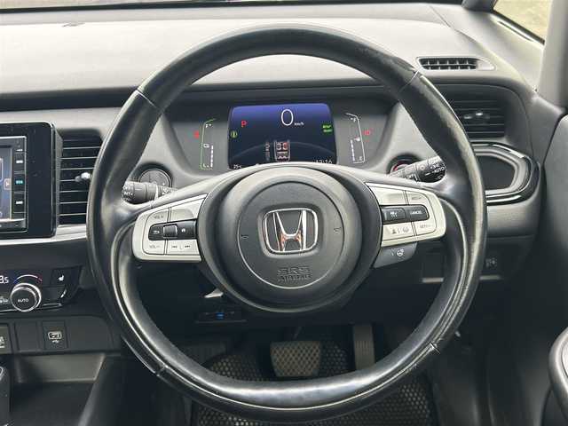 ホンダ フィット e:HEVリュクス 福島県 2020(令2)年 3.2万km ミッドナイトブルービームM 4WD/ホンダセンシング/衝突軽減ブレーキ〈CMBS〉/誤発進抑制機能/後方誤発進抑制機能/近距離衝突軽減ブレーキ/歩行者事故低減ステアリング/路外逸脱抑制機能/渋滞追従機能付アダプティブ・クルーズ・コントロール〈ACC〉/車線維持支援システム〈LKAS〉/先行車発進お知らせ機能/標識認識機能/オートハイビーム/純正ナビゲーション/型番：VXM-205Ci/【CD/SD/USB/BT】/バックカメラ/ドライブレコーダー/ビルトインETC/前席シートヒーター/ステアリングヒーター/LEDオートライト/LEDフォグランプ/純正フロアマット/ドアバイザー