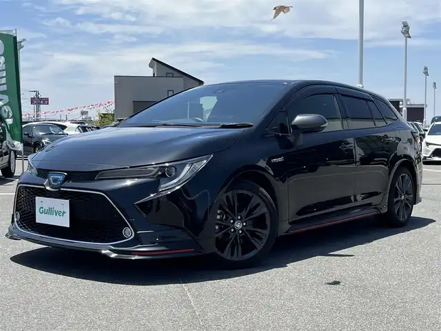 トヨタ カローラツーリング ハイブリッド ダブルバイビー 奈良県 2020(令2)年 3.8万km ブラックマイカ 純正９インチナビ　/ＡｐｐｌｅＣａｒｐｌａｙ　/ＡｎｄｒｏｉｄＡｕｔｏ　/電動パーキングブレーキ　/ブレーキホールド　/ヘッドアップディスプレイ　/ブラインドスポットモニター　/ＵＳＢ入力端子　/ＴＲＤフルエアロ