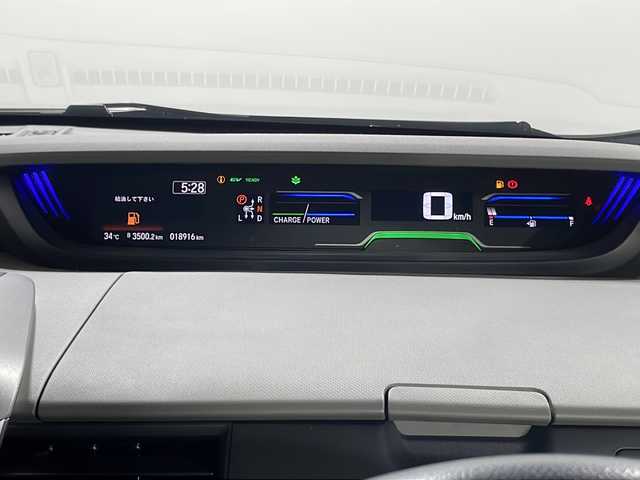 ホンダ フリード ハイブリット G 広島県 2023(令5)年 1.9万km プラチナホワイトパール 禁煙/１０型ナビ/両側パワースライドドア　/バックカメラ　/シートヒーター（D/N）/ハーフレザー/レーダークルーズコントロール/コーナーセンサー/ＥＴＣ/衝突軽減/レーンキープアシスト/オートライト/ＬＥＤヘッドライト