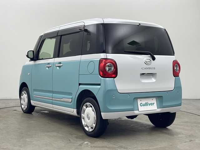 ダイハツ ムーヴ キャンバス ストライプス G 秋田県 2022(令4)年 1.7万km シャイニングホワイトパール/ファインミントメタリック 4WD/スマートアシスト/社外SDナビ/　　CD/DVD/Bluetooth/フルセグ/バックカメラ/両側パワースライドドア/LEDオートライト/LEDフォグランプ/オートマチックハイビーム/前席シートヒーター/コーナーセンサー/純正フロアマット/スマートキー