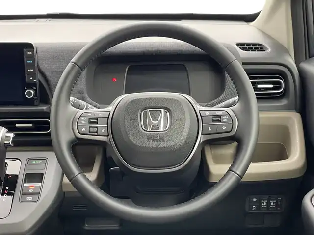 ホンダ フリード ハイブリット e:HEV AIR EX 新潟県 2025(令7)年 0.1千km メテオロイドグレーメタリック 4WD/純正9インチメモリナビ【LXM-242ZFNI】/　フルセTV/Bluetooth/AppleCarPlay/AndroidAuto/ブラインドスポットインフォメーション/踏み間違い衝突軽減システム/レーダークルーズコントロール/衝突被害軽減ブレーキ/レーンキープアシスト/前後コーナーセンサー/両側パワースライドドア/前席シートヒーター/バックモニター/リアクーラー/横滑り防止装置/LEDヘッドライト/オートマチックハイビーム/オートライト/レザーステアリング/ステアリングスイッチ/禁煙車