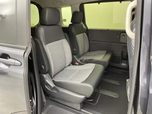 ホンダ フリード ハイブリット e:HEV AIR EX 新潟県 2025(令7)年 0.1千km メテオロイドグレーメタリック 4WD/純正9インチメモリナビ【LXM-242ZFNI】/　フルセTV/Bluetooth/AppleCarPlay/AndroidAuto/ブラインドスポットインフォメーション/踏み間違い衝突軽減システム/レーダークルーズコントロール/衝突被害軽減ブレーキ/レーンキープアシスト/前後コーナーセンサー/両側パワースライドドア/前席シートヒーター/バックモニター/リアクーラー/横滑り防止装置/LEDヘッドライト/オートマチックハイビーム/オートライト/レザーステアリング/ステアリングスイッチ/禁煙車