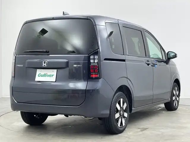 ホンダ フリード ハイブリット e:HEV AIR EX 新潟県 2025(令7)年 0.1千km メテオロイドグレーメタリック 4WD/純正9インチメモリナビ【LXM-242ZFNI】/　フルセTV/Bluetooth/AppleCarPlay/AndroidAuto/ブラインドスポットインフォメーション/踏み間違い衝突軽減システム/レーダークルーズコントロール/衝突被害軽減ブレーキ/レーンキープアシスト/前後コーナーセンサー/両側パワースライドドア/前席シートヒーター/バックモニター/リアクーラー/横滑り防止装置/LEDヘッドライト/オートマチックハイビーム/オートライト/レザーステアリング/ステアリングスイッチ/禁煙車