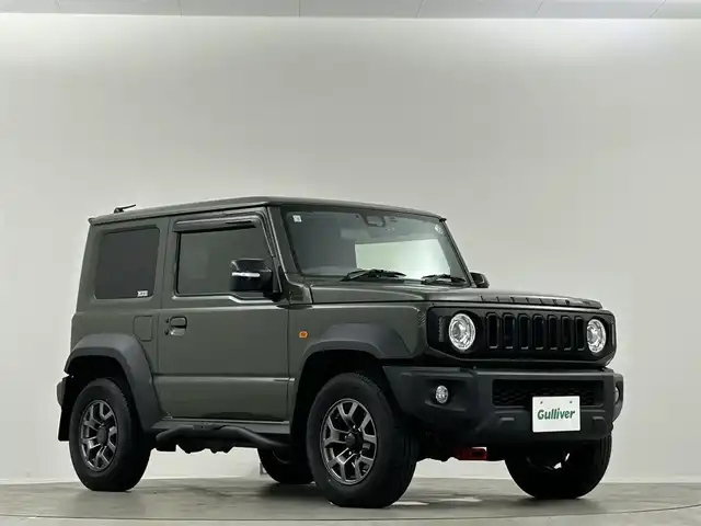 スズキ ジムニー シエラ JC 埼玉県 2020(令2)年 1.3万km ジャングルグリーン 社外グリル 社外テールライト　リアシーケンシャルウィンカー 9インチナビ シートヒーター クルーズコントロール サイドステップバー スズキセーフティセンス ETC 禁煙車 前後ドライブレコーダー