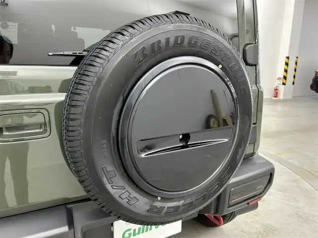 スズキ ジムニー シエラ JC 埼玉県 2020(令2)年 1.3万km ジャングルグリーン 社外グリル 社外テールライト　リアシーケンシャルウィンカー 9インチナビ シートヒーター クルーズコントロール サイドステップバー スズキセーフティセンス ETC 禁煙車 前後ドライブレコーダー