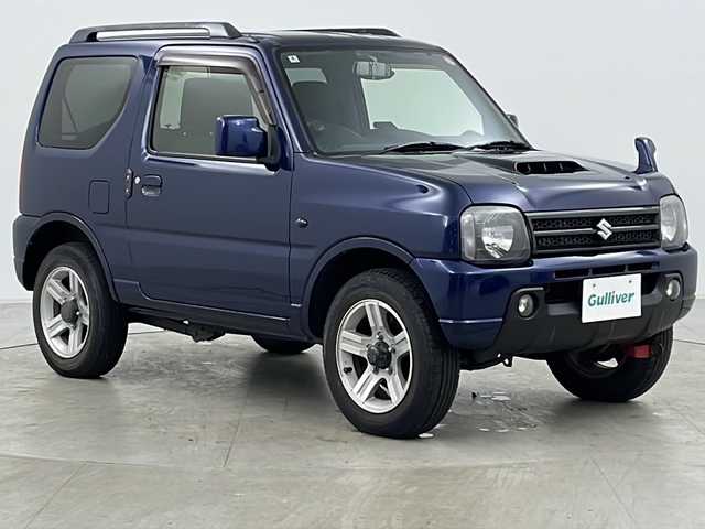 スズキ ジムニー XC 道央・札幌 2014(平26)年 13.6万km ノクターンブルーパール ・4WD/・寒冷地仕様/・社外ナビ（BT DVD CD）/・ルーフレール/・背面タイヤ/・社外ブースト計/・社外マルチメーター/・社外マフラー/・社外AW付き冬タイヤ積載/・社外インテークチャンバー/・社外ブローオフバルブ