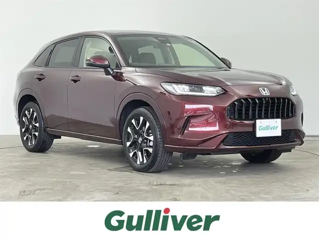 ホンダ ＺＲ－Ｖ ハイブリッド e:HEV Z 千葉県 2022(令4)年 0.4万km ワイン 禁煙車/Honda SENSING/・衝突軽減ブレーキ/・先行車発進お知らせ機能/・歩行者事故低減ステアリング/・路外逸脱抑制機能/・標識認識機能/・アダプティブクルーズコントロール/・車線維持支援システム/・渋滞運転支援機能/・ブラインドスポットインフォメーション/・誤発進抑制機能/・後方誤発進抑制機能/・近距離衝突軽減ブレーキ/・パーキングセンサーシステム/純正9インチホンダコネクトナビ/・フルセグTV/・Bluetooth接続/BOSEプレミアムサウンドシステム/アラウンドビューモニター/レーダークルーズコントロール/LEDオートライト/オートハイビーム/レザーシート/シートヒーター/パワーシート/純正18インチアルミホイール/純正フロアマット/パドルシフト/オートエアコン/USBポート/プッシュスタート/スマートキー