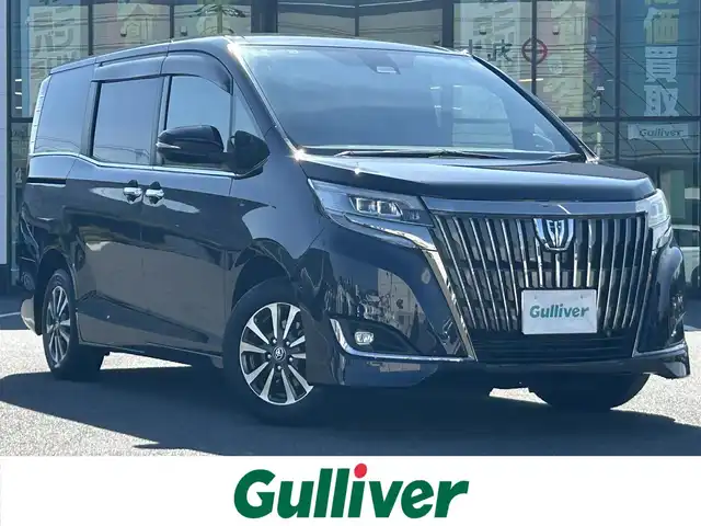 トヨタ エスクァイア Gi プレミアムパッケージ ブラックテーラード 岡山県 2019(平31)年 8.6万km スパークリングブラックパールクリスタルシャイン 純正10インチSDナビゲーション/・フルセグTV/CD/DVD/SD/Bluetooth/純正フリップダウンモニター/バックカメラ/ビルトインETC/両側パワースライドドア/後席エアコン/ハーフレザーシート/DN席シートヒーター/キャプテンシート/ISOFIX対応/革巻きステアリング/ステアリングヒーター/ステアリングリモコン/純正15インチアルミホイール/純正LEDヘッドライト/・オートマチックハイビーム/純正LEDフォグランプ/純正フロアマット/純正ドアバイザ―/新車保証書/トヨタセーフティセンス/・クルーズコントロール/・プリクラッシュセーフティ/・クリアランスソナー/・先行車発進お知らせ機能/・レーンディパーチャーアラート