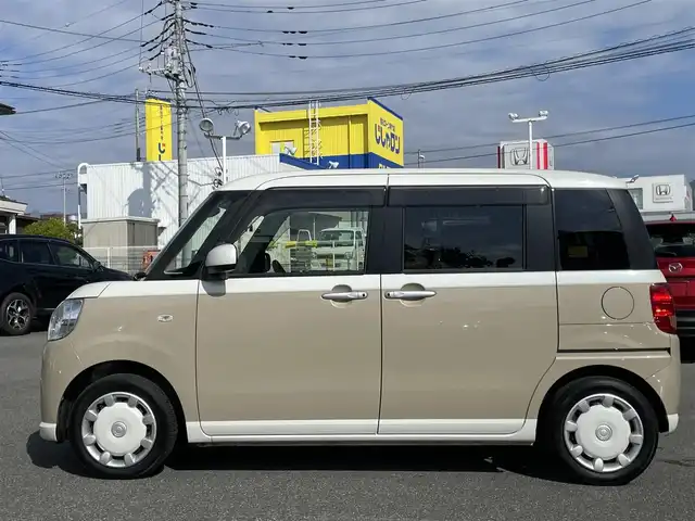 ダイハツ ムーヴ キャンバス X LTD SA Ⅱ 山梨県 2017(平29)年 9.8万km パールホワイトⅢ/ナチュラルベージュマイカメタリック 2トーン (株)IDOMが運営する【じしゃロン甲府店】の自社ローン専用車両になります。/こちらは現金またはオートローンご利用時の価格です。自社ローンご希望の方は別途その旨お申付け下さい/純正メモリーナビ/（フルセグＴＶ・ＣＤ・ＤＶＤ・BTオーディオ）/スマートアシストII/両側パワースライドドア/スマートキー/新車時保証書/取扱説明書/ナビ取扱説明書