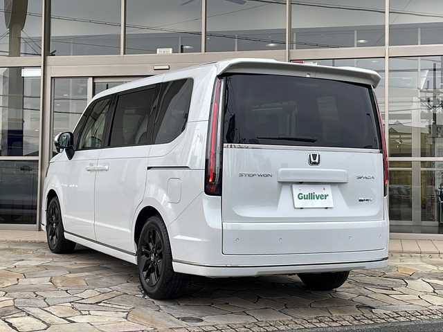 ホンダ ステップワゴン スパーダ eHEV 静岡県 2025(令7)年 0.1千km プラチナホワイトパール 純正メモリナビ/・CD/・DVD/・フルセグＴＶ/・Bluetooth/・USB/・HDMI/・AM/・FM/主要装備/・両側パワスラ/・後席モニター/・衝突軽減/・レーンキープ/・追従クルコン/・BSM/・コーナーセンサー前後/・バックカメラ/・パワーバックドア/・ハーフレザーシート/・シートヒーターD/N席/・パドルシフト/・ステリモ/・電動パーキングブレーキ/・オートホールド/・LEDヘッドライト/・オートライト/・オートハイビーム/・フォグランプ/・純正アルミホイール