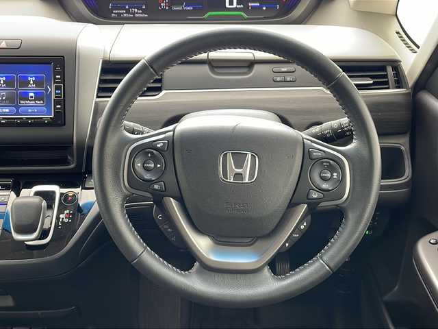 ホンダ フリード ハイブリット G ホンダセンシング 沖縄県 2020(令2)年 6.6万km シルバーミストグリーンM 純正ナビ(VXM-204VFi)/（フルセグＴＶ　ラジオ　ＣＤ　ＤＶＤ　Ｂｌｕｅｔｏｏｔｈ）/バックカメラ/ドライブレコーダー/ＥＴＣ/ホンダセンシング/ステアリングスイッチ/クルーズコントロール/両側パワースライドドア/ＬＥＤヘッドライト/オートライト/クリアランスソナー/スマートキー/プッシュスタート/純正フロアマット/純正15インチアルミホイール/保証書