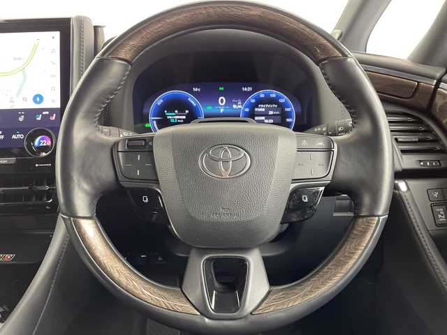 トヨタ ヴェルファイア ハイブリット エグゼクティブ ラウンジ 大阪府 2024(令6)年 3.1万km プラチナホワイトパールマイカ トヨタセーフティーセンス/　・プリクラッシュセーフティ/　・レーントレーシングアシスト/　・レーンディパーチャーアラート/　・レーダークルーズコントロール/　・ロードサインアシスト/　・オートマチックハイビーム/トヨタチームメイト/　・アドバンストパーク/　・パーキングサポートブレーキ/　・アドバンストドライブ/ムーンルーフ/フリップダウンモニター/JBLサウンドシステム/純正メモリナビ/　　BT/フルセグTV/パノラミックビューモニター/バックカメラ/両側パワースライドドア/パワーバックドア/LEDオートライト/フォグランプ/レザーシート/パワーシート/シートヒーター/エアーシート/純正19インチアルミホイール/置くだけ充電/ヘッドアップディスプレイ/ブラインドスポットモニター/リアクロストラフィックオートブレーキ/デジタルインナーミラー/ステアリングヒーター/パドルシフト/スマートキー/ビルトインETC2.0