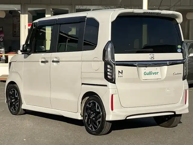 ホンダ Ｎ ＢＯＸ カスタム G L ターボ ホンダセンシング 千葉県 2019(令1)年 1.1万km プラチナホワイトパール ホンダセンシング/・レーダークルーズコントロール/・衝突軽減ブレーキ/・レーンキープアシスト/・オートマチックハイビーム/・先行車発進お知らせ機能/両側パワースライドドア/純正SDナビ【VXM-204VFi】/(CD/DVD/MSV/Bluetooth/フルセグTV)/バックカメラ/ハーフレザーシート/前席シートヒーター/革巻きステアリング/ステアリングリモコン/プッシュスタート/スマートキー×2/オートライト/純正LEDヘッドライト/フォグランプ/純正15インチアルミホイール/前方社外ドライブレコーダー/ビルトインETC/電動格納ミラー/ドアバイザー/サイド＆カーテンエアバッグ/新車時保証書＆取扱説明書