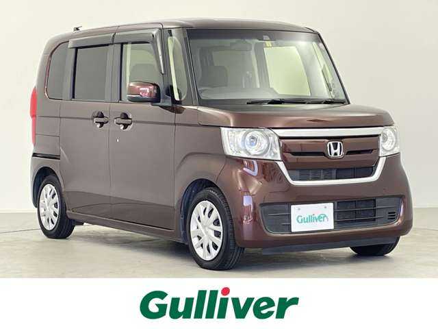 ホンダ Ｎ ＢＯＸ G L ターボ ホンダセンシング 千葉県 2018(平30)年 7.2万km プレミアムアガットブラウンP 禁煙車/Honda SENSING/・衝突軽減ブレーキ/・誤発進抑制機能/・後方誤発進抑制機能/・歩行者事故低減ステアリング/・路外逸脱抑制機能/・アダプティブ・クルーズ・コントロール/・車線維持支援システム/・オートハイビーム/・先行車発進お知らせ機能/・標識認識機能/両側パワースライドドア /純正７インチナビ/・フルセグ、CD・DVD、Bluetooth/フルLEDヘッドライト/・プロジェクタータイプ/・オートレベリング/オートライトコントロール機構付/プッシュスタート/スマートキー/取説