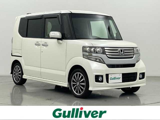 ホンダ Ｎ ＢＯＸ カスタム G ターボSSパッケージ 熊本県 2013(平25)年 5.3万km プレミアムホワイトパール 社外ディスプレイオーディオ　/両側パワースライドドア　/バックカメラ　/クルーズコントロール　/横滑り防止　/パドルシフト/純正フロアマット　/純正１５インチＡＷ　/オートライト　/ＨＩＤライト　/フォグライト　/スマートキー/プッシュスタート/スペアキー1本/取扱説明書