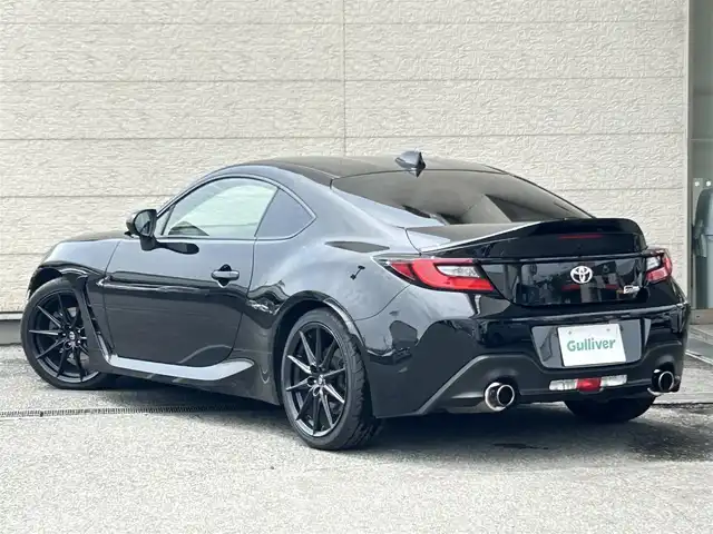トヨタ ＧＲ８６ RZ 兵庫県 2021(令3)年 3.4万km クリスタルブラックシリカ 純正9インチナビ（NSZT-Y68T）/フルセグTV/Bluetooth/CD/DVD/USB/TVキャンセラー/バックカメラ/ETC/社外レーダー探知機/BSM（ブラインドスポットモニター）/SRH（ステアリング連動ランプ）/NARDIステアリング/ステアリングスイッチ/純正ステアリング積み込み/HKS製マフラー/ダックテールウイング/ハーフレザーシート/前席シートヒーター/LEDヘッドライト/リアフォグランプ/オートライト/純正18インチAW/プッシュスタート/スマートキー/スペアキー/取扱説明書