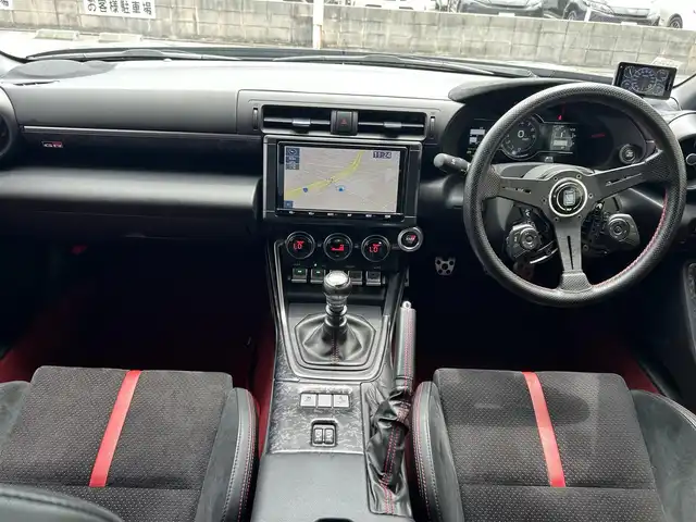 トヨタ ＧＲ８６ RZ 兵庫県 2021(令3)年 3.4万km クリスタルブラックシリカ 純正9インチナビ（NSZT-Y68T）/フルセグTV/Bluetooth/CD/DVD/USB/TVキャンセラー/バックカメラ/ETC/社外レーダー探知機/BSM（ブラインドスポットモニター）/SRH（ステアリング連動ランプ）/NARDIステアリング/ステアリングスイッチ/純正ステアリング積み込み/HKS製マフラー/ダックテールウイング/ハーフレザーシート/前席シートヒーター/LEDヘッドライト/リアフォグランプ/オートライト/純正18インチAW/プッシュスタート/スマートキー/スペアキー/取扱説明書