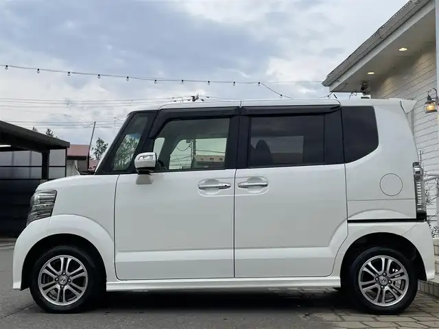 ホンダ Ｎ ＢＯＸ カスタム G SSパッケージ 秋田県 2014(平26)年 9.6万km プレミアムホワイトパール (株)IDOMが運営する【じしゃロン 秋田店】の自社ローン専用車両になります。こちらは現金またはオートローンご利用時の価格です。自社ローンご希望の方は別途その旨お申付け下さい/メモリナビ/ワンセグテレビ/バックカメラ/ウィンカーミラー/ドアバイザー/プッシュスタート/両側パワースライドドア/スマートキー