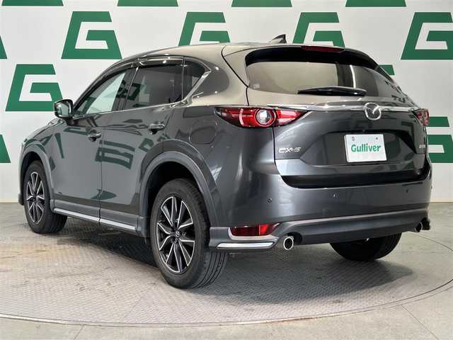 マツダ ＣＸ－５ XD Lパッケージ 鹿児島県 2017(平29)年 8.3万km マシーングレープレミアムM BOSEプレミアムサウンド/誤発進抑制制御機能（前後）/リヤパーキングセンサー/スマートブレーキサポート/全車速追従機能付マツダレーダークルーズコントロール/アダプティブLEDヘッドライト/レーンキープアシストシステム/車線逸脱警報システム/ブラインドスポットモニタリング/ドライバーアテンションアラート/交通標識認識システム/アイドリングストップ/純正SDナビ/（CD/DVD/フルセグ/Bluetooth/AUX）/バック・サイドカメラ/ETC/社外前後ドライブレコーダー【ZDR-015】/革巻きステアリング/ステアリングリモコン/ステアリングヒーター/前席シートヒーター/前席パワーシート/運転席シートメモリ/純正LEDヘッドライト/オートライト/ヘッドアップディスプレイ/電動パーキングブレーキ/ブレーキホールド/電動格納ドアミラー/純正ラバーマット/純正トノカバー/純正ドアバイザー/純正19インチアルミ