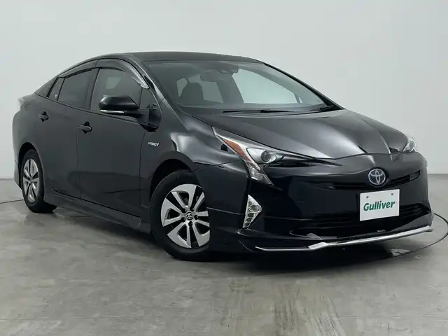 トヨタ プリウス A プレミアム 三重県 2018(平30)年 7万km アティチュードブラックマイカ 禁煙車/トヨタセーフティセンス/レーンキープアシスト/純正９インチナビ/CD/BT/SD/フルセグTV/バックカメラ/ヘッドアップディスプレイ/前席シートヒーター/クリアランスソナー/モデリスタエアロ/ルーフラッピング/レーダークルーズコントロール/ブラインドスポットモニター/パーキングアシスト/ビルトインETC/ワイヤレス充電/純正ドライブレコーダー/オートハイビーム