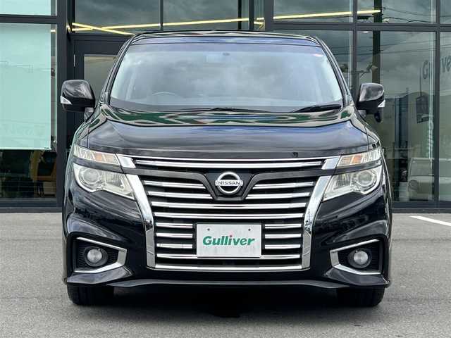 日産 エルグランド 250ハイウェイスター 愛媛県 2014(平26)年 7.2万km ファントムブラック 純正8インチナビ【MM513D-L】/　CD/DVD/Bluetooth/フルセグTV/バックカメラ/ビルトインETC/ハーフレザーシート/左側パワースライドドア/純正18インチAW/オートライト/HIDヘッドライト/フロントフォグ/革巻きステアリング/プッシュスタート/フロアマット/オットマン